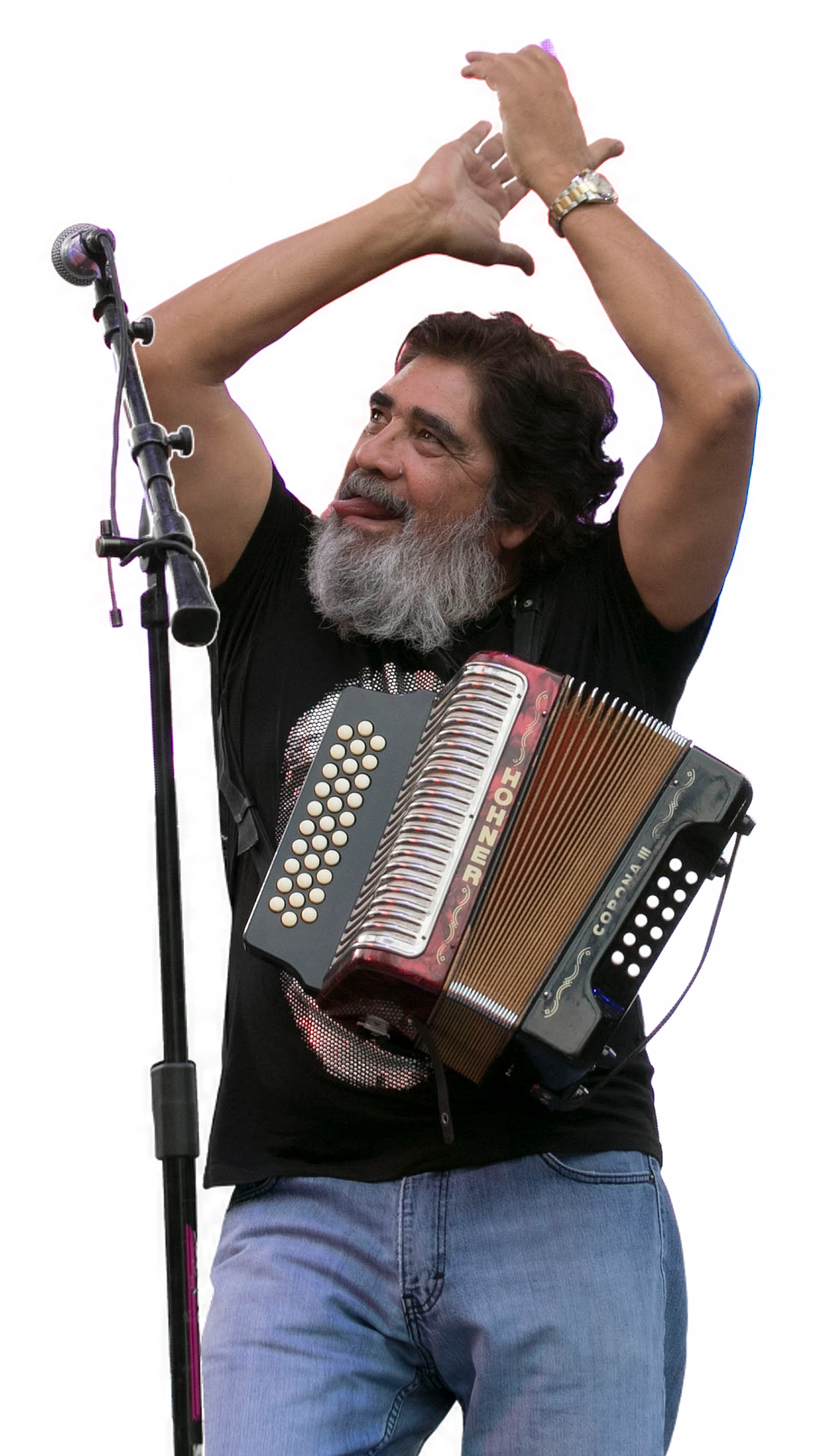 Celso Piña with his accordion, arms raised, at the Monumento a la Revolución in Mexico City, June 2017